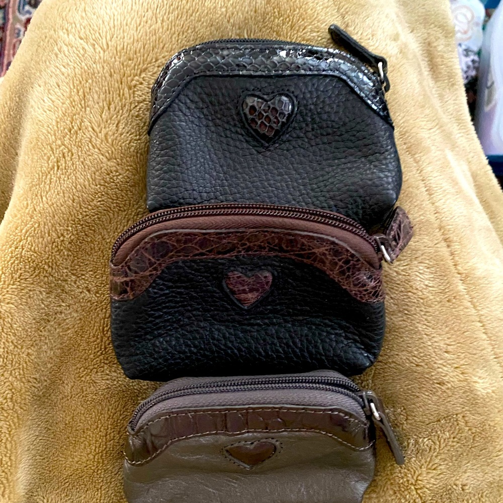 Three Brighton coin purses.